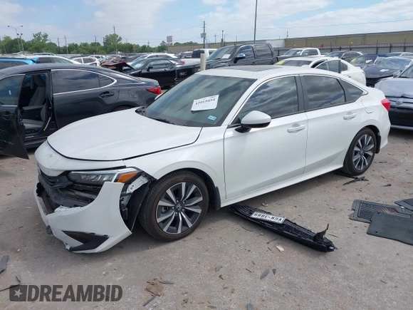 2024 Honda Civic EX z VIN 2HGFE1F7XRH323682, wystawiony jako IAAI lot #42019454 z przebiegiem 7 039 mil mil oraz . Historia ofert i sprzedaży dostępna na DreamBid. Obrazek 17.