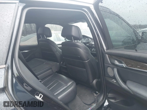 2014 BMW X5 xDrive50i with VIN 5UXKR6C59E0C03597, listed as a IAAI auction lot 41866944 with 65,890 mi miles. Bid and sale history available at carsss.com. Image 8.