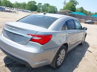 2013 Chrysler 200 Touring with VIN 1C3CCBBB6DN721743, listed as a IAAI auction lot 42079415 with 194,243 mi miles. Bid and sale history available at carsss.com. Image 4.