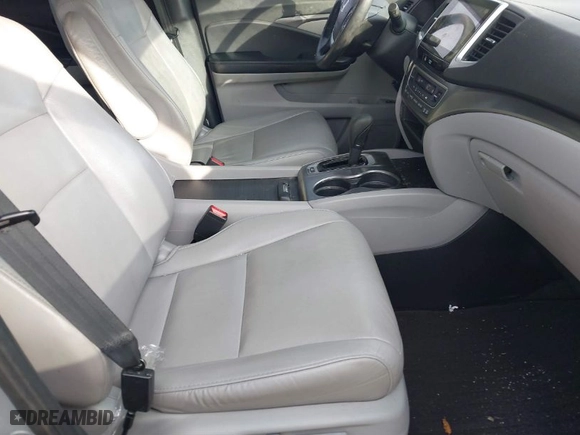 2018 Honda Pilot EX-L with VIN 5FNYF6H59JB026068, listed as a IAAI auction lot 41458049 with 128,769 mi miles. Bid and sale history available at carsss.com. Image 5.