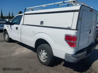 2014 Ford F-150 XL with VIN 1FTNF1CF5EKF62031, listed as a IAAI auction lot 41657632 with 216,689 mi miles. Bid and sale history available at carsss.com. Image 3.