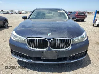 2018 BMW 7 Series 740i with VIN WBA7E2C58JG743126, listed as a Copart auction lot 53843795 with 90,614 mi miles and Salvage title. Bid and sale history available at DreamBid. Image 5.
