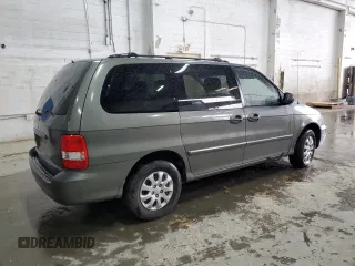 2005 Kia Sedona LX with VIN KNDUP132656723226, listed as a Copart auction lot 52886115 with 0 mi miles and Salvage Title. Bid and sale history available at carsss.com. Image 3.