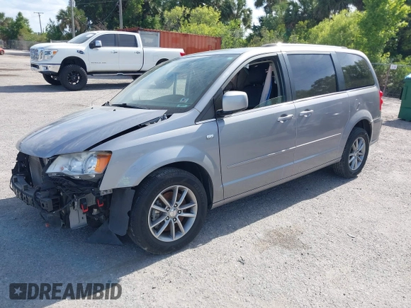 2014 Dodge Grand Caravan SXT with VIN 2C4RDGCG3ER193688, listed as a IAAI auction lot 41290544 with 73,092 mi miles and . Bid and sale history available at DreamBid. Image 18.