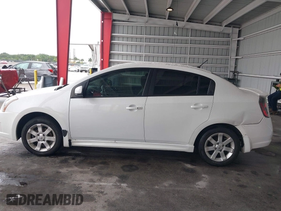 2010 Nissan Sentra S with VIN 3N1AB6AP1AL640075, listed as a IAAI auction lot 42244798 with 122,965 mi miles and . Bid and sale history available at DreamBid. Image 14.