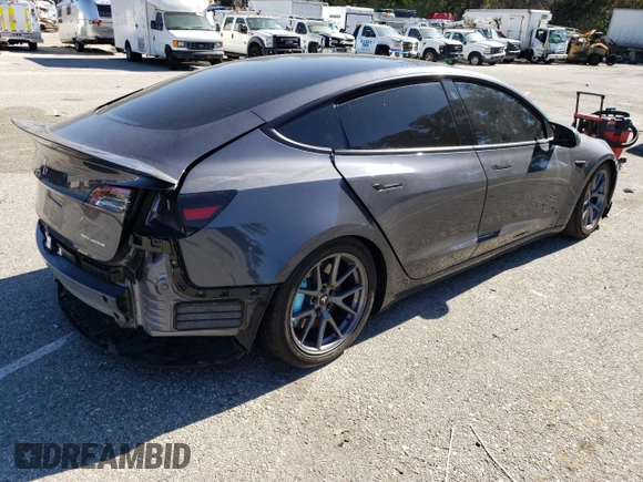 2023 Tesla Model 3 Long Range with VIN 5YJ3E1EB4PF633935, listed as a Copart auction lot 45238705 with 32,972 mi miles and Salvage Title. Bid and sale history available at DreamBid. Image 3.