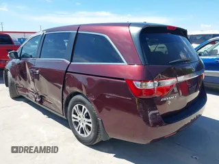 2011 Honda Odyssey EX-L with VIN 5FNRL5H60BB094647, listed as a IAAI auction lot 42223712 with 202,612 mi miles and . Bid and sale history available at carsss.com. Image 3.