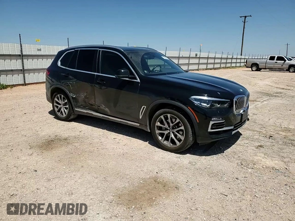 2021 BMW X5 sDrive40i with VIN 5UXCR4C09M9G23111, listed as a Copart auction lot 60509475 with 34,230 mi miles and Salvage title. Bid and sale history available at DreamBid. Image 14.