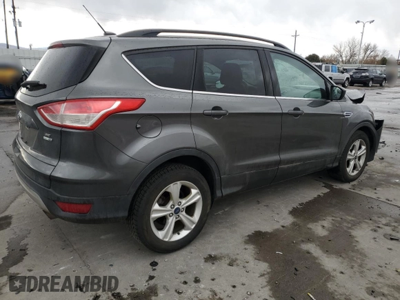 2016 Ford Escape SE with VIN 1FMCU9G97GUA48555, listed as a Copart auction lot 49285395 with 106,941 mi miles and Salvage Title. Bid and sale history available at DreamBid. Image 3.