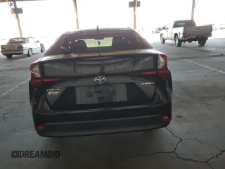 2020 Toyota Prius L Eco with VIN JTDKARFUXL3118256, listed as a Copart auction lot 50433035 with 69,431 mi miles and Salvage Title. Bid and sale history available at DreamBid. Image 6.