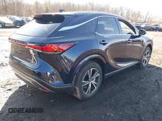 2024 Lexus RX with VIN 2T2BAMCA0RC073207, listed as a IAAI auction lot 41137585 with 6,910 mi miles. Bid and sale history available at carsss.com. Image 4.