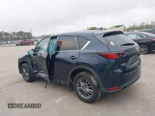 2017 Mazda CX-5 Touring with VIN JM3KFBCL9H0163449, listed as a IAAI auction lot 41919020 with 102,898 mi miles. Bid and sale history available at carsss.com. Image 3.