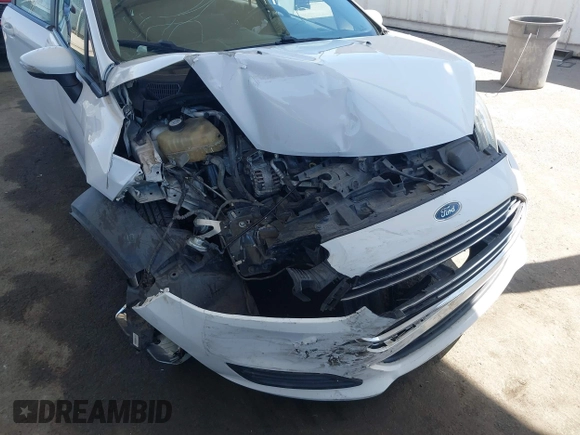 2014 Ford Fiesta SE z VIN 3FADP4EJ4EM117919, wystawiony jako IAAI lot #42262361 z przebiegiem 121 141 mil mil oraz . Historia ofert i sprzedaży dostępna na DreamBid. Obrazek 6.