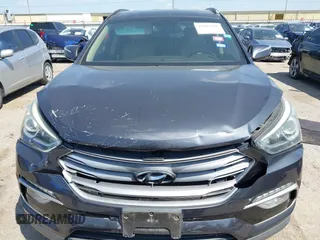 2017 Hyundai Santa Fe 2.4L z VIN 5XYZU3LB4HG462058, wystawiony jako IAAI lot #41861190 z przebiegiem 87 102 mil mil oraz . Historia ofert i sprzedaży dostępna na DreamBid. Obrazek 12.