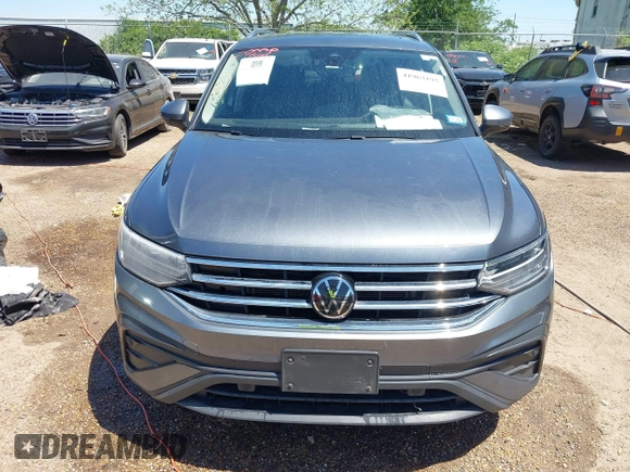 2023 Volkswagen Tiguan SE with VIN 3VVMB7AX4PM023080, listed as a IAAI auction lot 41963195 with 37,696 mi miles and . Bid and sale history available at DreamBid. Image 6.