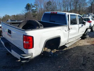 2017 GMC Sierra 2500HD Denali with VIN 1GT12UEG5HF177129, listed as a IAAI auction lot 41253163 with 183,743 mi miles. Bid and sale history available at carsss.com. Image 4.