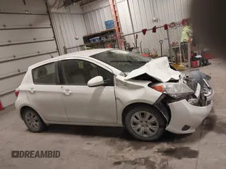 2013 Toyota Yaris L with VIN JTDKTUD33DD566664, listed as a IAAI auction lot 41524571 with 148,050 mi miles and . Bid and sale history available at DreamBid. Image 13.