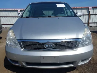 2012 Kia Sedona LX with VIN KNDMG4C70C6491703, listed as a IAAI auction lot 42128411 with 246,586 mi miles. Bid and sale history available at carsss.com. Image 6.