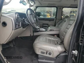 2004 Hummer H2 z VIN 5GRGN23U74H100175, wystawiony jako Copart lot #52642125 z przebiegiem 112 305 mil mil oraz Szkoda całkowita • Salvage title. Historia ofert i sprzedaży dostępna na DreamBid. Obrazek 7.