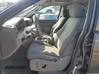 2006 Jeep Grand Cherokee Laredo with VIN 1J4HS48N96C357909, listed as a Copart auction lot 77551154 with 136,235 mi miles and Salvage Title. Bid and sale history available at carsss.com. Image 7.