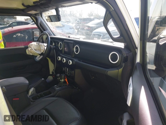 2021 Jeep Wrangler Unlimited Sahara z VIN 1C4JJXP6XMW765398, wystawiony jako IAAI lot #41592185 z przebiegiem 26 834 mil mil oraz . Historia ofert i sprzedaży dostępna na DreamBid. Obrazek 5.