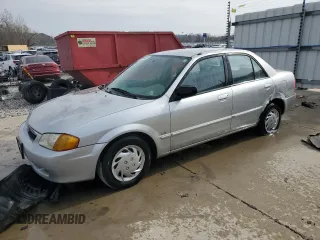 1999 Mazda Protege DX with VIN JM1BJ2229X0178306, listed as a Copart auction lot 50006525 with 215,749 mi miles and Salvage Title. Bid and sale history available at DreamBid. Image 1.