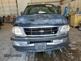 1998 Ford F-150 XL with VIN 1FTZX0725WKB83760, listed as a Copart auction lot 60988225 with 243,361 mi miles and Salvage title. Bid and sale history available at DreamBid. Image 5.
