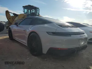 2023 Porsche 911 4S with VIN WP0BB2A9XPS233202, listed as a Copart auction lot 73859314 with 6,490 mi miles and Salvage Title. Bid and sale history available at carsss.com. Image 2.