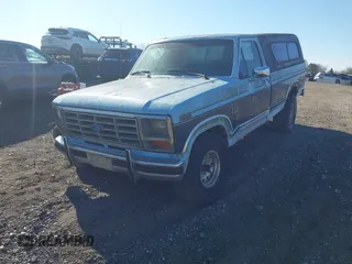 1986 Ford F-150 with VIN 1FTEF14N0GPA37633, listed as a IAAI auction lot 42084341 with 230,894 mi miles. Bid and sale history available at carsss.com. Image 2.