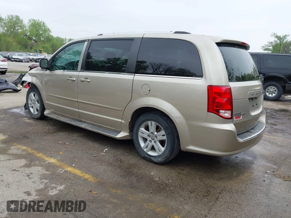 2013 Dodge Grand Caravan Crew with VIN 2C4RDGDG7DR624563, listed as a IAAI auction lot 42038157 with 265,044 mi miles and . Bid and sale history available at DreamBid. Image 3.