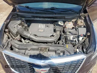 2021 Cadillac XT5 AWD Luxury z VIN 1GYKNBR44MZ162883, wystawiony jako Copart lot #59623725 z przebiegiem 50 006 mil mil oraz Szkoda całkowita • Salvage title. Historia ofert i sprzedaży dostępna na DreamBid. Obrazek 12.
