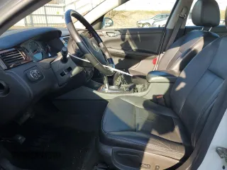 2014 Chevrolet Impala LTZ with VIN 2G1WC5E37E1186982, listed as a Copart auction lot 52500675 with 162,692 mi miles and Salvage Title. Bid and sale history available at DreamBid. Image 7.