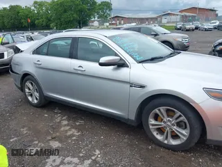 2015 Ford Taurus SEL with VIN 1FAHP2E91FG137696, listed as a IAAI auction lot 42168950 with 81,050 mi miles and . Bid and sale history available at DreamBid. Image 13.