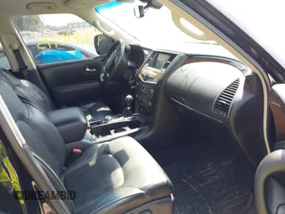 2014 Infiniti QX80 with VIN JN8AZ2NEXE9064144, listed as a IAAI auction lot 42810995 with 210,231 mi miles and . Bid and sale history available at DreamBid. Image 5.