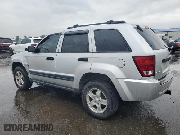 2005 Jeep Grand Cherokee Laredo with VIN 1J4GR48K55C719634, listed as a Copart auction lot 61809195 with 141,316 mi miles and Salvage title. Bid and sale history available at DreamBid. Image 2.