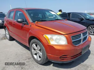 2010 Dodge Caliber SXT with VIN 1B3CB4HA9AD549848, listed as a IAAI auction lot 41915997 with 211,619 mi miles and . Bid and sale history available at DreamBid. Image 1.
