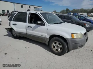 2001 Ford Escape XLT with VIN 1FMYU03121KC24061, listed as a Copart auction lot 75888584 with 155,901 mi miles and Salvage Title. Bid and sale history available at carsss.com. Image 4.
