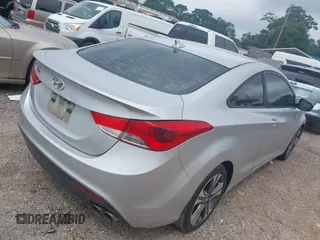 2013 Hyundai Elantra GS z VIN KMHDH6AE9DU002802, wystawiony jako IAAI lot #42433199 z przebiegiem 145 643 mil mil oraz . Historia ofert i sprzedaży dostępna na DreamBid. Obrazek 4.