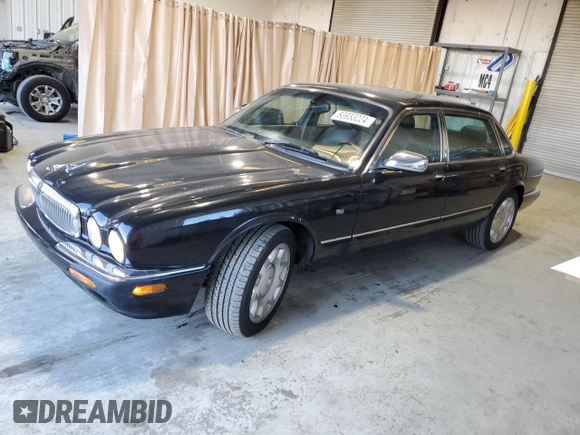 2001 Jaguar XJ with VIN SAJDA25B01MF26440, listed as a Copart auction lot 83933224 with 124,873 mi miles and Clean Title. Bid and sale history available at DreamBid. Image 1.