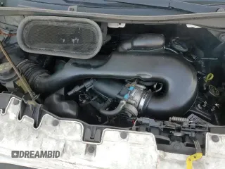 2019 Ford Transit z VIN 1FTYE1ZM6KKA48402, wystawiony jako Copart lot #86892884 z przebiegiem 118 636 mil mil oraz Szkoda całkowita • Salvage title. Historia ofert i sprzedaży dostępna na DreamBid. Obrazek 14.