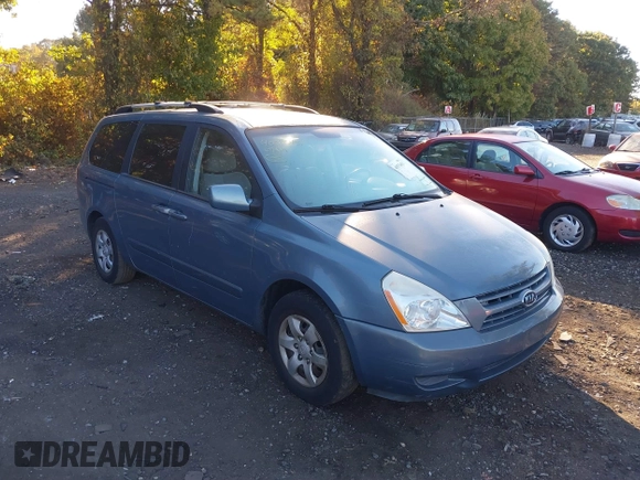2009 Kia Sedona LX with VIN KNDMB233996320165, listed as a IAAI auction lot 40575451 with 122,057 mi miles. Bid and sale history available at carsss.com. Image 1.