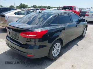 2015 Ford Focus SE with VIN 1FADP3F2XFL313657, listed as a IAAI auction lot 42205474 with 161,353 mi miles and . Bid and sale history available at DreamBid. Image 4.