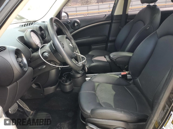 2014 MINI Countryman S with VIN WMWZC3C51EWP26751, listed as a Copart auction lot 49165415 with 131,590 mi miles and Clean Title. Bid and sale history available at DreamBid. Image 7.