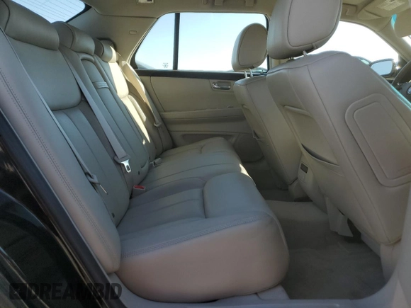 2008 Cadillac DTS 1SA z VIN 1G6KD57Y48U106139, wystawiony jako Copart lot #49046545 z przebiegiem 53 550 mil mil oraz Szkody całkowita. Historia ofert i sprzedaży dostępna na DreamBid. Obrazek 10.