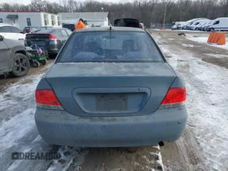 2006 Mitsubishi Lancer ES with VIN JA3AJ26E06U005019, listed as a IAAI auction lot 41381773 with 174,034 mi miles. Bid and sale history available at carsss.com. Image 16.