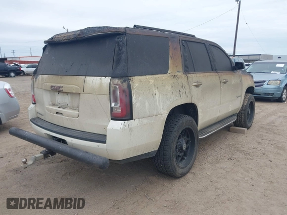 2015 GMC Yukon SLT with VIN 1GKS1BKC0FR114047, listed as a IAAI auction lot 41272792 with 1 mi miles. Bid and sale history available at carsss.com. Image 4.