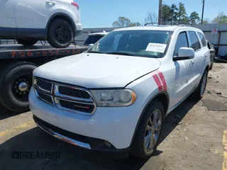 2013 Dodge Durango Crew with VIN 1C4RDHDG8DC698668, listed as a IAAI auction lot 41876841 with 160,012 mi miles and . Bid and sale history available at DreamBid. Image 17.