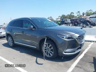 2016 Mazda CX-9 Signature z VIN JM3TCBEY4G0123297, wystawiony jako IAAI lot #42581289 z przebiegiem 85 253 mil mil oraz . Historia ofert i sprzedaży dostępna na DreamBid. Obrazek 1.