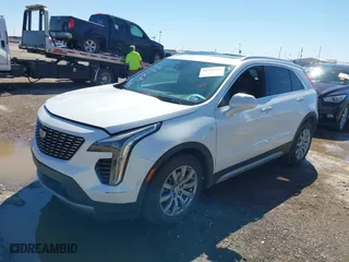 2020 Cadillac XT4 FWD Premium Luxury with VIN 1GYFZCR45LF138622, listed as a IAAI auction lot 41764535 with 99,079 mi miles. Bid and sale history available at carsss.com. Image 14.