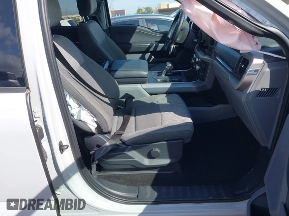 2023 Ford F-150 Lightning Pro z VIN 1FTVW1EL6PWG01336, wystawiony jako IAAI lot #41692903 z przebiegiem 39 085 mil mil oraz . Historia ofert i sprzedaży dostępna na DreamBid. Obrazek 5.